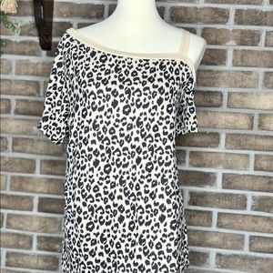 BMJL Size Large Leopard asymmetrical one sleeve top.